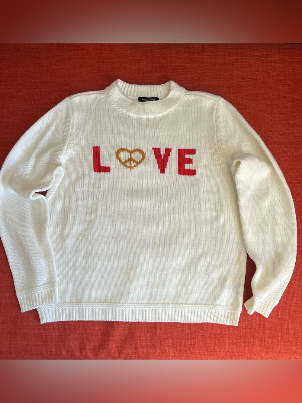 525 America White Sweater with LOVE Across the Front. 100% Acrylic. Size S.